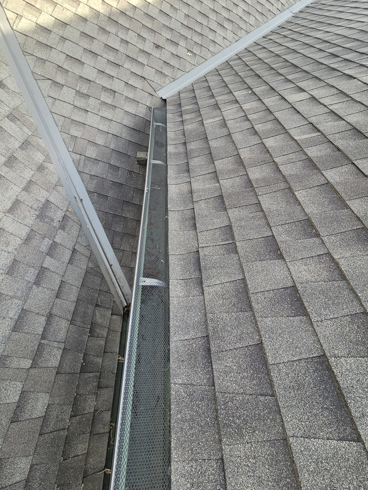 Screened gutter run after clearing