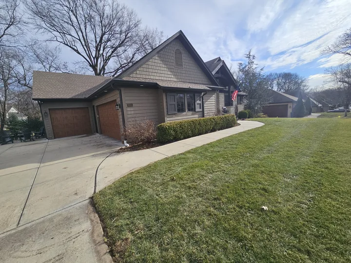 One-story Prairie Village home with walkout and existing screened gutters