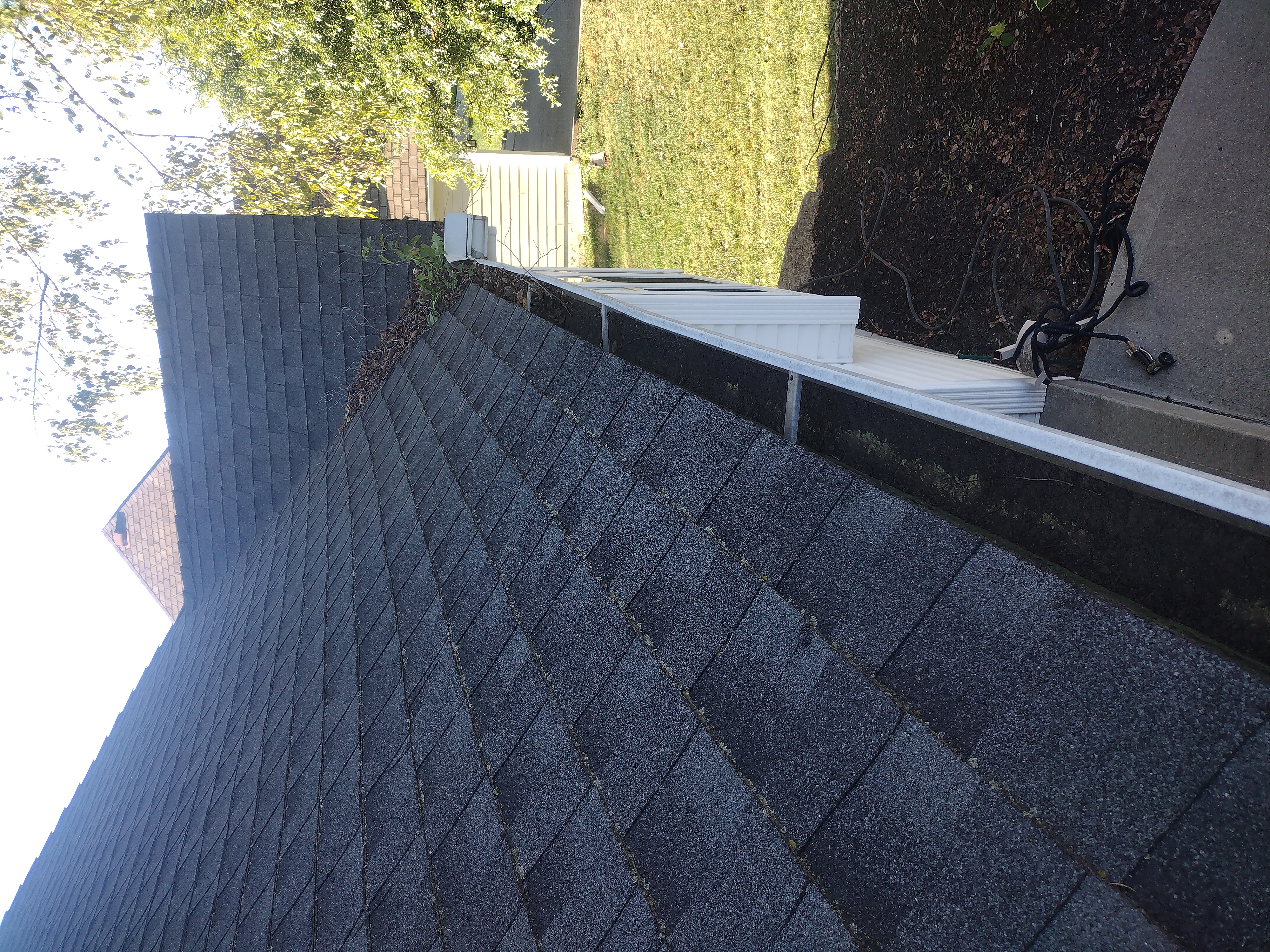 Front gutter run before cleaning with open track visible