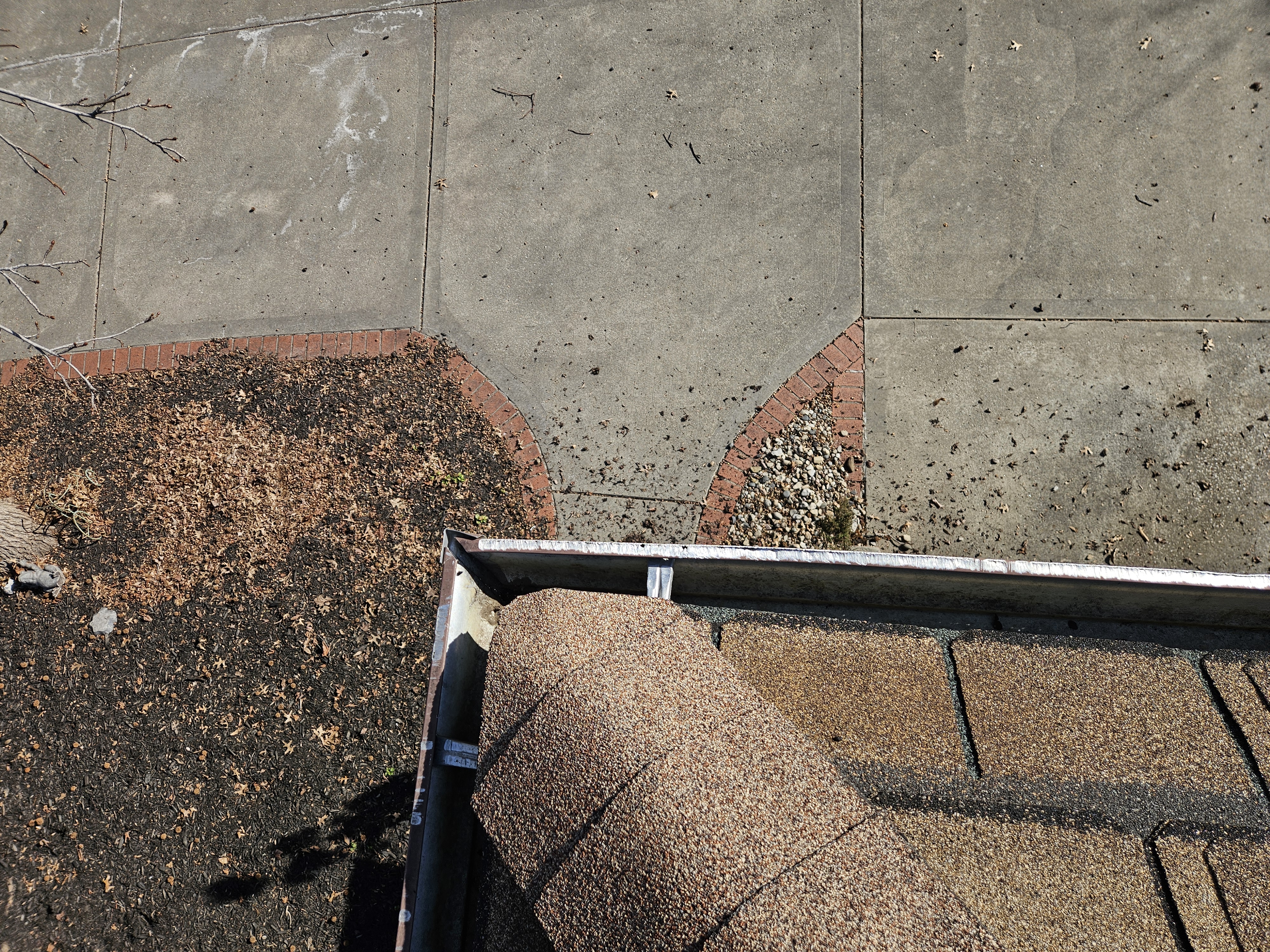 Upper-level gutter section after debris was removed