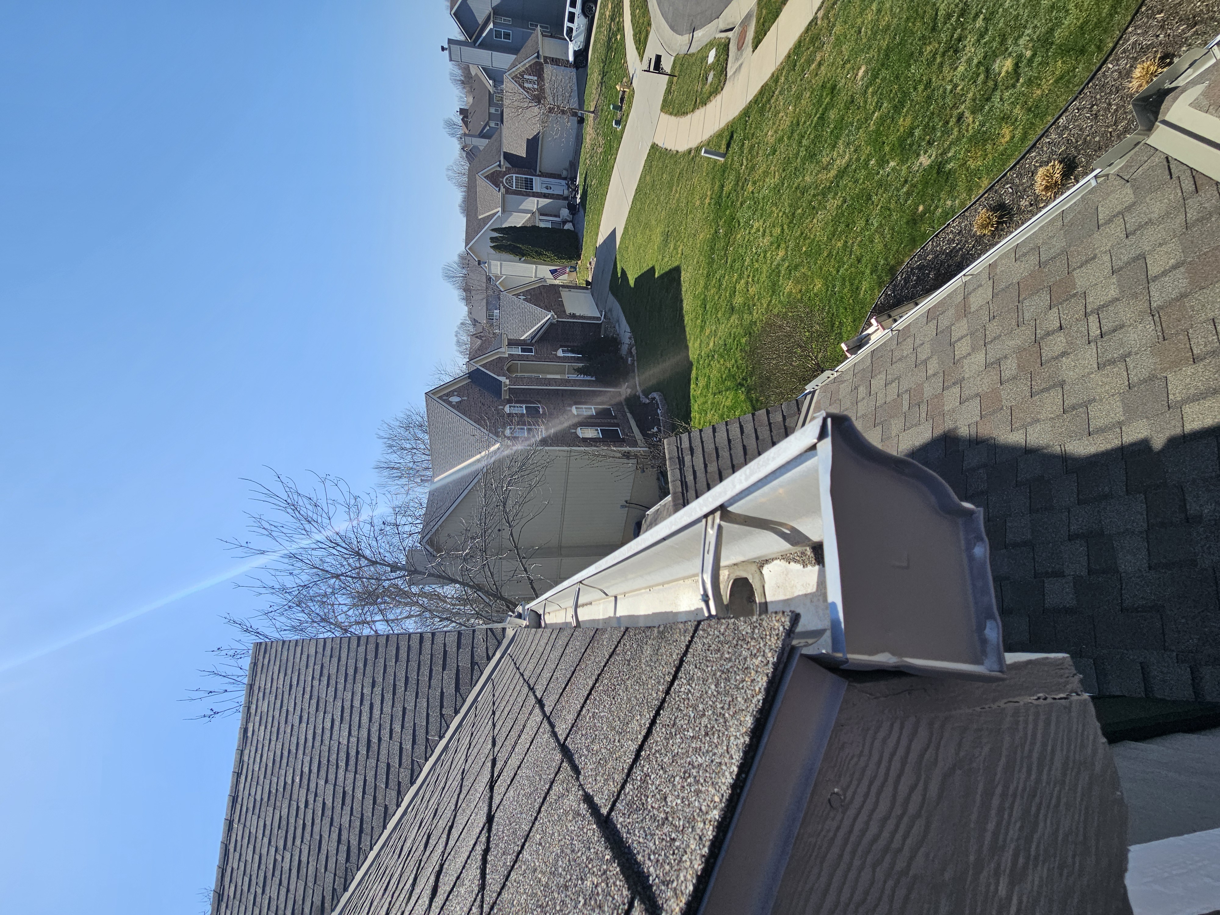 Upper front gutter section viewed from the roofline