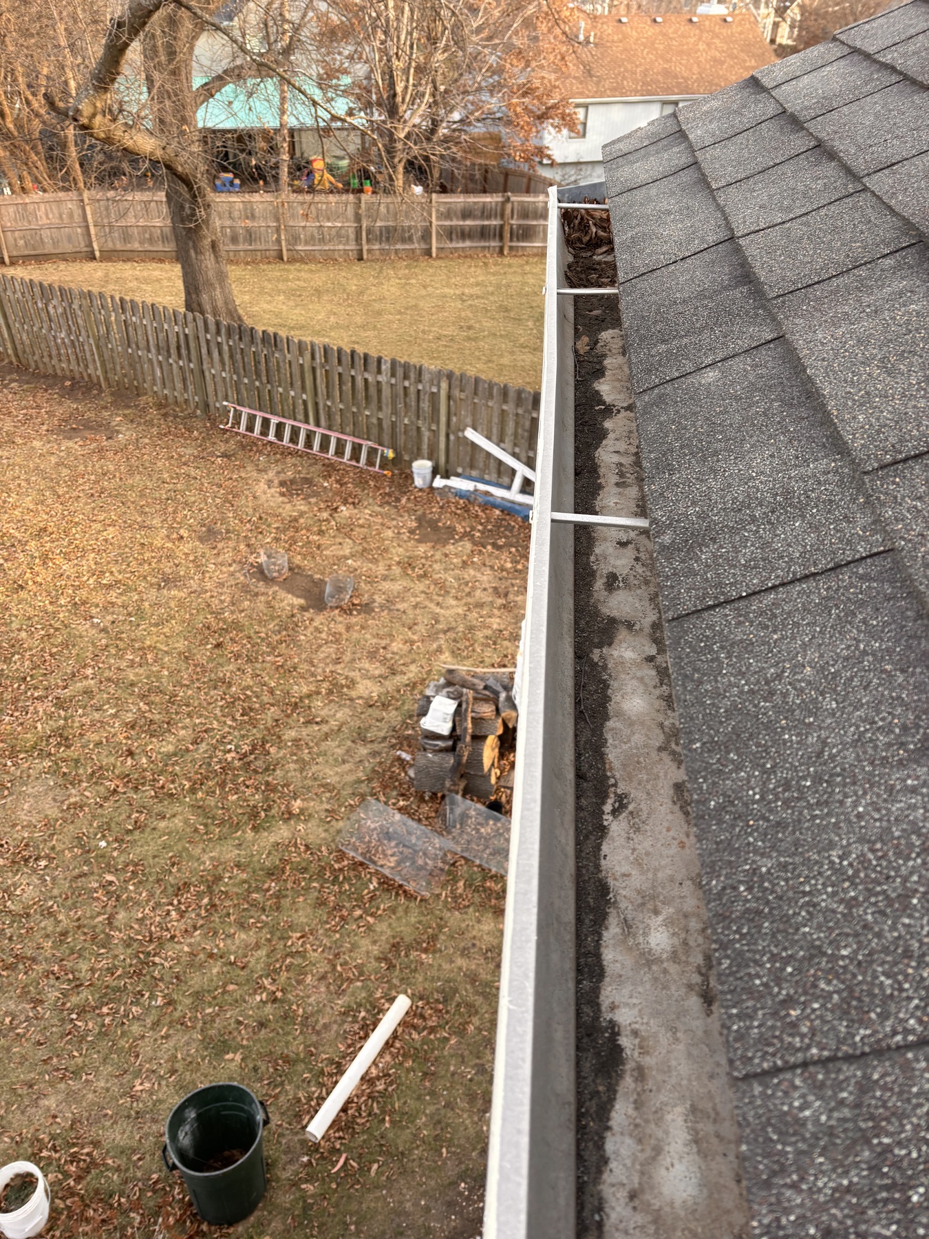 Upper gutter run after service showing a clearer channel